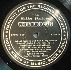 Image of Label Cover of LP - G+/G+ - THE WHITE STRIPES, White Blood Cells (SFTRI; SFTRI660, US 2001, 4 Page Insert, No Barcode, First Pressing), Quite a few light marks and hairlines and mottling to both sides of disc, Plays VG, Wear to all edges of sleeve, ring wear and corner bumps,  - 2416073C