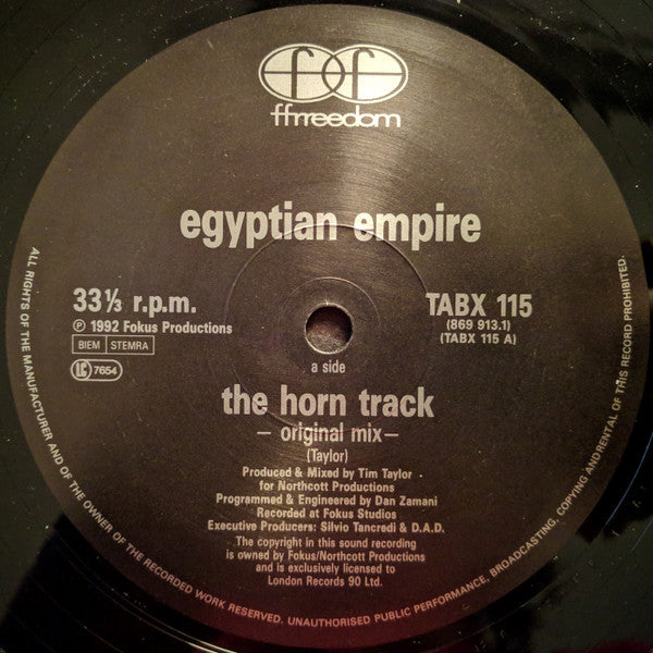 Image of Label Cover of 12" - G+/G+ - EGYPTIAN EMPIRE, The Horn Track (Ffrreedom; 869 913-1, UK 1992, Titled Company Sleeve), Light marks, minor warp & some foxing, plays well. Edgewear to sleeve & a small tear on the open side.,  - 2526248E
