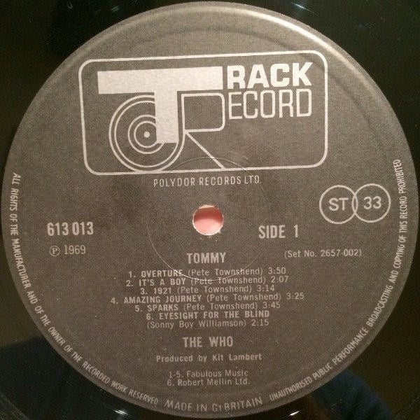 Image of Label of 3414013C: 2xLP - THE WHO, Tommy (Track; 613013/4, UK 1969, Howards Printers Unlaminated Triple Gatefold Sleeve, UnnumberedBooklet , Autocoupled) Many hairlines but nothing too deep, Sleeve has edge wear, Includes booklet  VG/G+