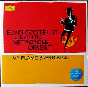 Image of Front Cover of 2xLP - VG+/VG+ - ELVIS COSTELLO, Live With The Metropole Orkest - My Flame Burns Blue (Deutsche Grammophon; 479 6062, Europe 2016 Reissue, Gatefold, Insert, Blue Vinyl), ,  - 2226350E
