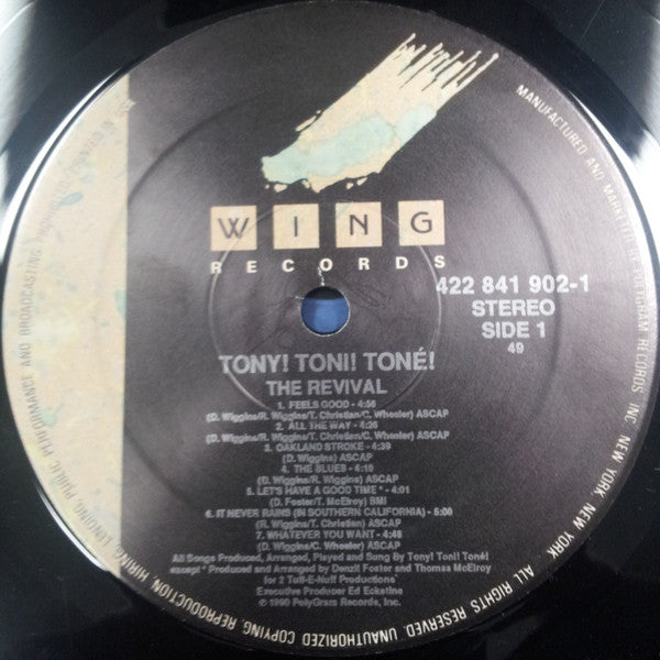 Image of Label Cover of 4614193C: LP - TONY! TONI! TON !, The Revival (Wing Records; 841 902-1, US 1990) Sleeve worn and damaged at edges and spine. Scuffs and liquid stains too  G+/G+