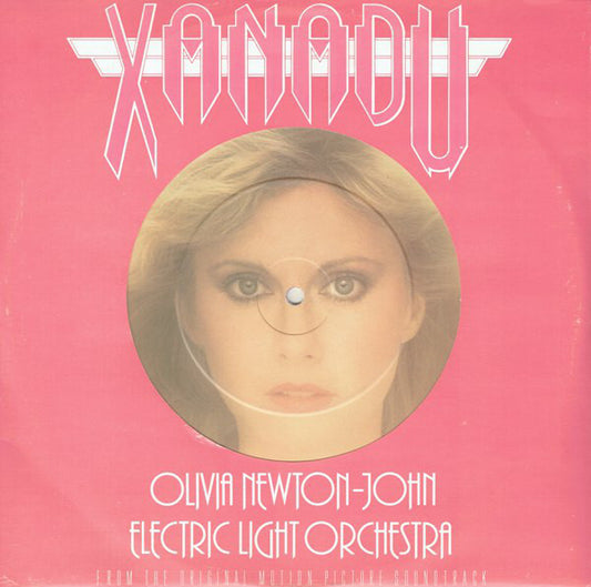 Image of Front Cover of 2424316E: 10" EP - OLIVIA NEWTON-JOHN & ELECTRIC LIGHT ORCHESTRA, Xanadu (Jet Records; JET 10 185, UK 1980, Die Cut Picture Sleeve, Pink Vinyl)   VG/VG