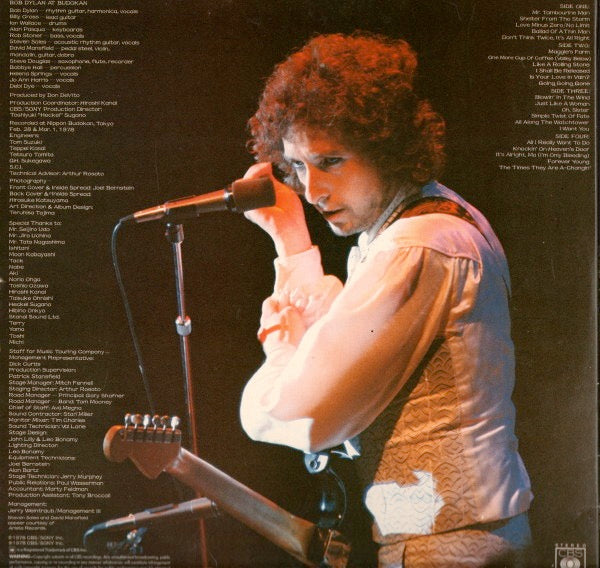 Image of Back Cover of 2xLP - G+/VG - BOB DYLAN, At Budokan (CBS; CBS 96004, UK 1979, Gatefold, Booklet, Poster, Made In England at Bottom of Label), Damp Damage to Sleerve, Poster and Booklet,  - 2226100E