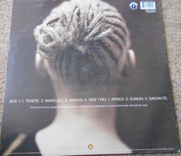 Image of Back Cover of 3414125C: LP - SALIF KEITA, "Folon"...The Past (Mango ; MLPS 1108, Europe 1995, Picture Sleeve, Inner) Minor egde wear to sleeve. Lightest of marks to vinyl. Inner is EX. Great copy all round!  VG+/VG+