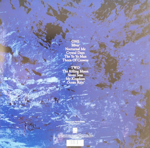 Image of Back Cover of LP - NEW/NEW - ECHO AND THE BUNNYMEN, Ocean Rain (Rocktober Exclusive) (Rhino; 0190295360863, UK 2021 Reissue, Inner), , Channeling the lessons of the experimental Porcupine into more conventional and simple structural parameters, Ocean Rain emerges as Echo and the Bunnymen's most beautiful and memorable effort. Ornamenting Ian McCulloch's most consistently strong collection of songs to date with subdued guitar textures, sweeping string arrangements, and hauntingly evocative productio