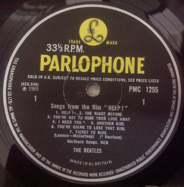Image of Label Cover of LP - G+/G - THE BEATLES, Help! (Parlophone Black/Yellow; PMC 1255, UK 1965, Laminated Flipback Sleeve, Mono, First pressing, XEX 549-2, XEX 550-2, Sans Serif Font, K/T  Tax Code), Fogging, light scratches and hairlines. Tear to opening edge, staining and heavy creasing. Very subtle mal-aligned ink colouring to sleeve.,  - 3246352S