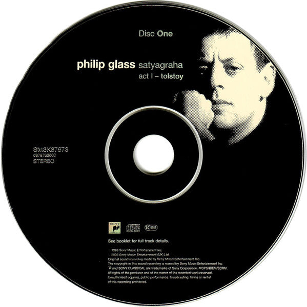 Image of Label Cover of 3xCD - VG/VG - PHILIP GLASS - NEW YORK CITY OPERA ORCHESTRA AND CHORUS, CHRISTOPHER KEENE, Satyagraha (Sony Classical ; 0879732000, Austria 2003, Box Set, Booklet), Dent In Box, Minor Marks on CD,  - 3836090E