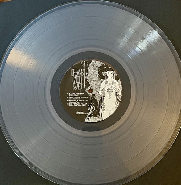 Image of Label Cover of LP - NEW/NEW - GABOR SZABO, Dreams (Ebalunga!!! ; EBL-003LP, Austria 2021 Reissue, Gatefold, Clear Vinyl, Ltd Ed. of 700, Bonus Tracks), , The long-awaited reissue of the best ever album of rare Eastern and psychedelic Jazz music by this famous Hungarian guitarist Gabor Szabo, originally released in 1968. Gabor Szabo was one of the most original guitarists to emerge in the 1960s, mixing his Hungarian folk music heritage with a deep love of jazz and crafting a distinctive, largely sel