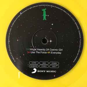 Image of Label Cover of 2xLP - EX/VG+ - JAMIROQUAI, Travelling Without Moving (Sony Music ; 19439905091, Europe 2022 Reissue, Gatefold, 2 Inners & Insert, Remastered, Stereo, Yellow 180g Vinyl, 25th Anniversary Edition.), Still In Opened Shrinkwrap With Hype Sticker,  - 3416015C