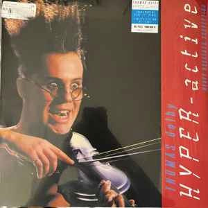 Image of Front Cover of 4933063E: 12" - THOMAS DOLBY, Hyperactive (RSD 2022) (BMG; 4050538748000, Europe 2022 Reissue, Record Store Day 2022, Transparent Blue Vinyl)   NEW/NEW