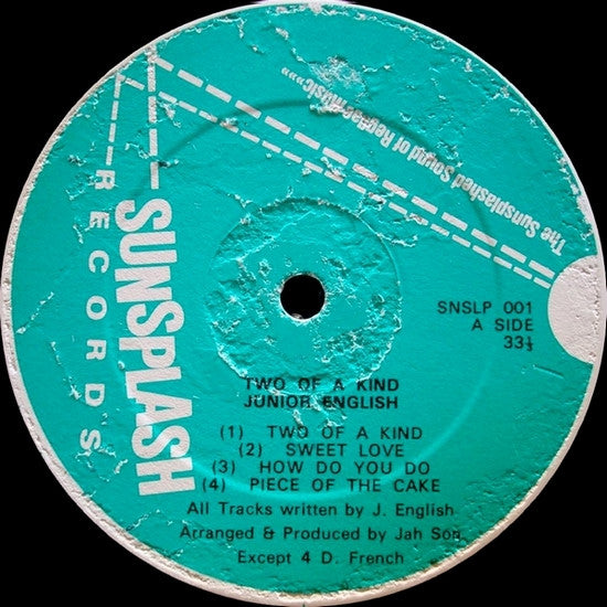 Image of Label Cover of LP - VG/VG - JUNIOR ENGLISH, Two Of A Kind (Sunsplash; SNS LP 001, UK 1983, Picture Sleeve), Conservative grading, shiny disc with light marks. Creases on sleeve, weak VG.,  - 2146145S