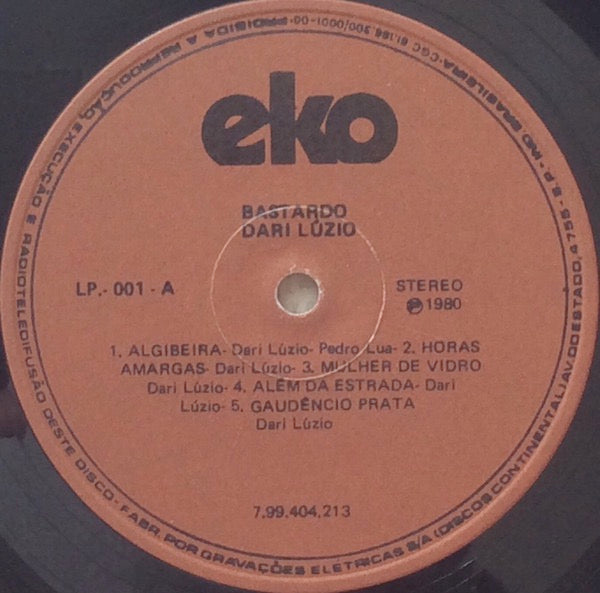 Image of Label Cover of 2722129E: LP - DARI LUZIO, Bastardo (Eko; Lp-001, Brazil 1980, Booklet) Two Long Surface Marks Which Do Not Sound, Damage To Top Corner Of Sleeve, Edge Wear  G/VG+