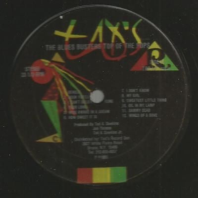 Image of Front Cover of LP - /VG - THE BLUES BUSTERS, Top Of The Pops (Tad's Records; TRD LP 8181, US 1981, Plain Sleeve), Weak looking VG, plays fine. Plain sleeve., A1	BeholdA2	Soon You'll Be GoneA3	I Can't Believe That You GoneA4	Your LoveA5	Wide Awake In A DreamA6	How Sweet It IsA7	I Don't KnowA8	My GirlA9	Sweetest Little ThingA10	Oil In My LampA11	Sammy DeadA12	Wings Of A DoveB1	Monkey ManB2	Sweet SensationB3	Rivers Of BabylonB4	007B5	I Shall Be ReleasedB6	On The BeachB7	Wear You To T