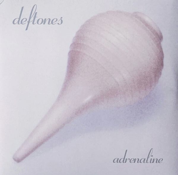 Image of Front Cover of LP - NEW/NEW - DEFTONES, Adrenaline (Maverick; 9362 49578-1, Europe 2011 Reissue, Insert, 180 Gram Vinyl), , Deftones introduced themselves to the world with Adrenaline (1995), a critically acclaimed set which featured fan favourite tracks such as "Bored" and "7 Words", but it was with Around The Fur that the band earned the attention of a far larger audience as it topped the billboard heat-seekers chart, helped in part by two of the band's most famous moments "My Own Summer (Shove I