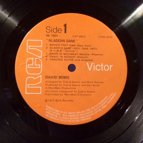 Image of Label Cover of LP - VG/VG - DAVID BOWIE, Aladdin Sane (RCA Victor NO "STEREO" ; RS 1001, UK 1970s Reissue, Single Sleeve, Insert, Published by Mainman/Chrysalis Side One), Light hairlines. Sleeve has ringwear and staining. ,  - 2426006E