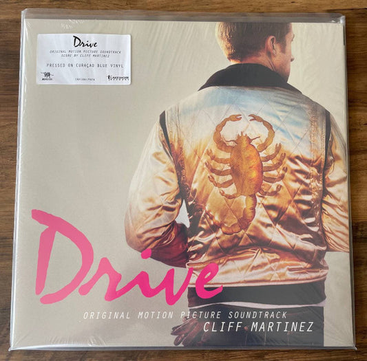 Image of Front Cover of 2xLP - VG/VG+ - CLIFF MARTINEZ, Drive (Original Motion Picture Soundtrack) (Invada; INV106LPNEW, UK 2021, Gatefold, Transparent Curacao Blue Vinyl), ,  - 2116136C