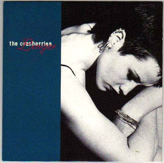 Image of Front Cover of 7" - VG/VG - THE CRANBERRIES, Linger (Island Records; IS 559, UK 1994, Picture Sleeve), Strong VG, very light marks. Moderate wear and a light crease to rear of sleeve.,  - 3316322C