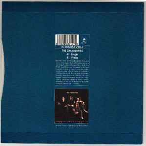 Image of Back Cover of 7" - VG/VG - THE CRANBERRIES, Linger (Island Records; IS 559, UK 1994, Picture Sleeve), Strong VG, very light marks. Moderate wear and a light crease to rear of sleeve.,  - 3316322C