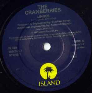 Image of Label Cover of 7" - VG/VG - THE CRANBERRIES, Linger (Island Records; IS 559, UK 1994, Picture Sleeve), Strong VG, very light marks. Moderate wear and a light crease to rear of sleeve.,  - 3316322C