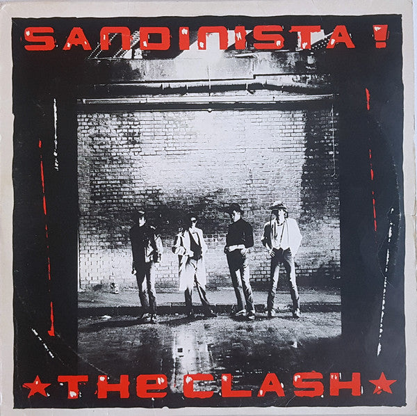 Image of Front Cover of 3624346E: 3xLP - THE CLASH, Sandinista! (CBS; FSLN 1, UK 1980, Newspaper Insert, 'Unknown Credits / Copyright Control' Version, Hype sticker, Stereo, NO "Printed in England by Robor Limited" on back cover) Split Seam, Ripped Corner, Damage to Sleeve Opening, Heavy Edge and Ring Wear  G/VG