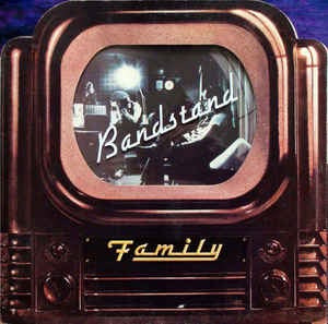Image of Front Cover of 4745393S: LP - FAMILY, Bandstand (Reprise Tan, No WB Logo; K 54006, UK 1972, Die Cut Gatefold Sleeve With Plastic Window, Die Cut Inner, Stereo) Very slight dishing to disc. Hairlines, scuffs. Edge wear. Small seam split to inner.  VG/VG