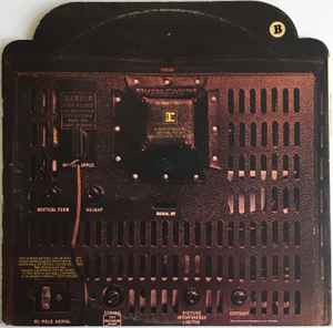 Image of Back Cover of 4745393S: LP - FAMILY, Bandstand (Reprise Tan, No WB Logo; K 54006, UK 1972, Die Cut Gatefold Sleeve With Plastic Window, Die Cut Inner, Stereo) Very slight dishing to disc. Hairlines, scuffs. Edge wear. Small seam split to inner.  VG/VG