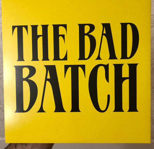 Image of Back Cover of 3123119E: 2xLP - VARIOUS, The Bad Batch - Original Motion Picture Soundtrack (Death Waltz Recording Company; DW110, US 2017, Gatefold Die-cut, 2 Inners, Obi strip, Limited Edition; Psychedelic Swirl + Smiley Face Yellow & Black Vinyl)   VG+/VG+