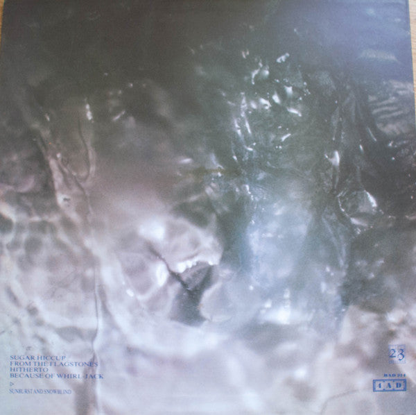 Image of Back Cover of 12" - VG/VG - COCTEAU TWINS, Sunburst And Snowblind (4AD; BAD 314, UK 1983, Picture Sleeve, 'Satin' Sleeve), Light Marks only.,  - 2526456E