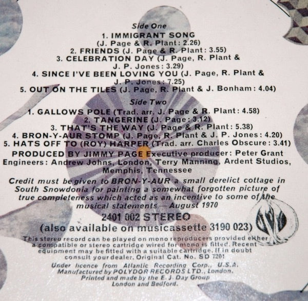 Image of Back Cover of LP - G+/F - LED ZEPPELIN, Led Zeppelin III (Atlantic Plum & Orange; 2401002, UK 1970, Rotating Gatefold, Peter Grant Credit on sleeve not label,  Cat No. Has Hyphen, "Do What Thou Wilt" Run Out Groove, Credits On Right Inside Gatefold, A5 (Etched) / B5 or B7 Run Outs, Celebration Misprint on Label), Lots of marks, Scuffs and hairlines, Plays with surface noise but not terrible, Sleeve is a bit worn but intact with a strip of old glue present inside gatefold spine. , Peter Grant credit