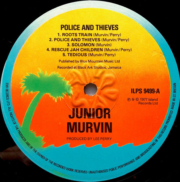 Image of Label Cover of 0245285S: LP - JUNIOR MURVIN, Police & Thieves (Island Orange Sunset, Blue Rim With Text; ILPS9499, UK 1977, Company Inner) Cover is strong VG with only light edge wear.   VG/VG+