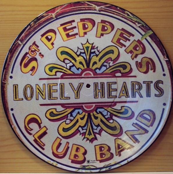 Image of Back Cover of LP - VG/VG - THE BEATLES, Sgt. Pepper's Lonely Hearts Club Band (Capitol; SEAX11840, US 1978 Reissue, Die Cut Sleeve, Picture Disc), ,  - 2626023E
