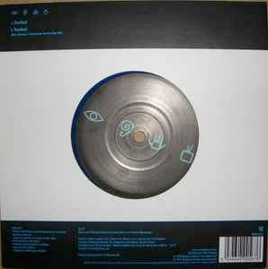 Image of Back Cover of 7" - VG+/VG+ - VAST, Touched (Mushroom; MUSH56S, UK 1999, Die-Cut Sleeve, Blue Translucent Vinyl.), Promo sticker on back of sleeve.,  - 2556070S