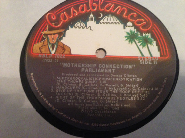 Image of Label Cover of LP - VG/VG - PARLIAMENT, Mothership Connection (Casablanca Bogart; NBLP 7022, US 1975, Pitman Pressing), Sleeve has some spine wear and light ring wear. Disc has a fair few light hairlines/marks but plays well!,  - 2716267C