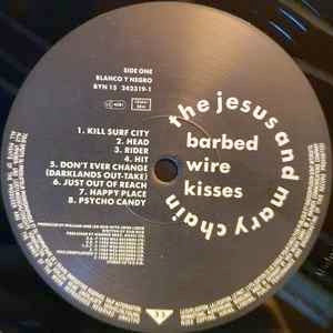 Image of Label Cover of 5124288E: LP - THE JESUS AND MARY CHAIN, Barbed Wire Kisses (B-Sides And More) (Blanco Y Negro; BYN 15, UK 1988, Black Inner, C Price Code.) Vinyl is glossy. Sleeve has tiny sticker removal tear in top right and 2 small creases.  VG+/VG+