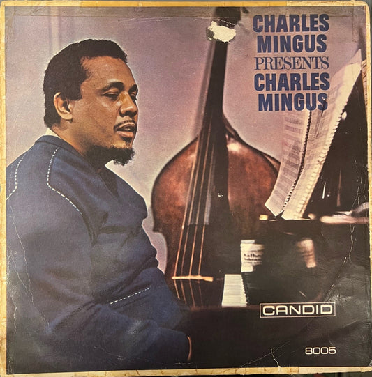 Image of Front Cover of 0824028E: LP - CHARLES MINGUS, Presents Charles Mingus (Candid (Solid Orange Deep Groove); CJM 8005, US 1960s, Flipback Sleeve, Mono) Many light hairlines - plays with surface noise throughout. Sleeve has wear, splits, tape, creases, ringwear and small patch of peel/damage to front.  G/G+