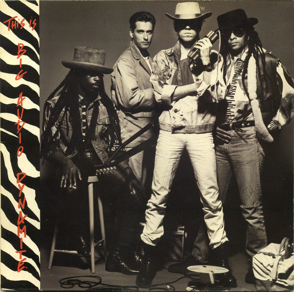 Image of Front Cover of 2424391E: LP - BIG AUDIO DYNAMITE, This Is Big Audio Dynamite (CBS; CBS 26714, UK 1985, Inner, No Barcode.) Hype stickered sleeve.  VG/VG+