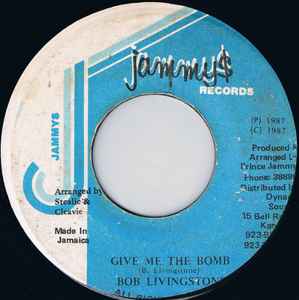 Image of Front Cover of 1054177S: 7" - BOB LIVINGSTONE, Give Me The Bomb (Jammy's Records; none, Jamaica 1987, Plain sleeve) Marks on vinyl.  /VG