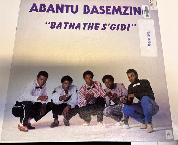 Image of Front Cover of 1124475E: 12" - ABANTU BASEMZINI, Bathathe S'gidi (The CCP Record Company (Pty) Ltd.; JPL (O) 4051611, South Africa 1986, Picture Sleeve) Clean sleeve and clean labels.  VG+/VG+