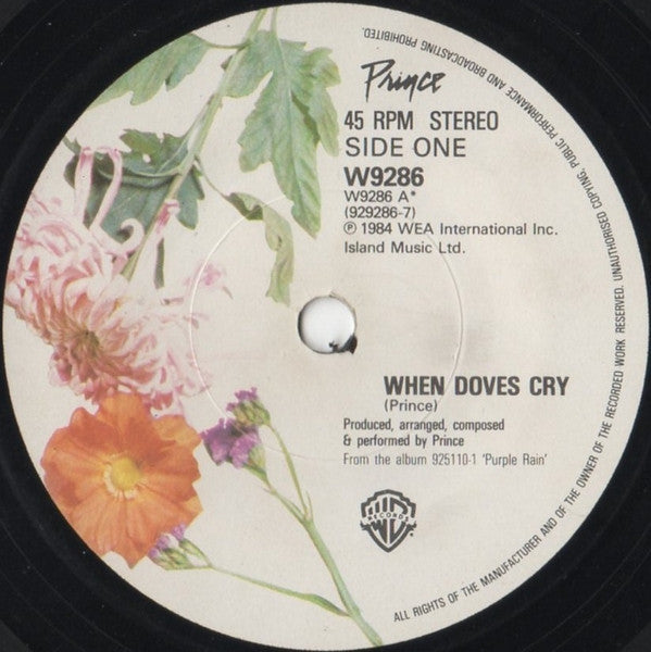 Image of Label Cover of 1524212E: 7" - PRINCE, When Doves Cry/ 17 Days (Warner Bros. Records; W9286, UK 1984, Picture sleeve) Light wear on edge of sleeve.  VG/VG+