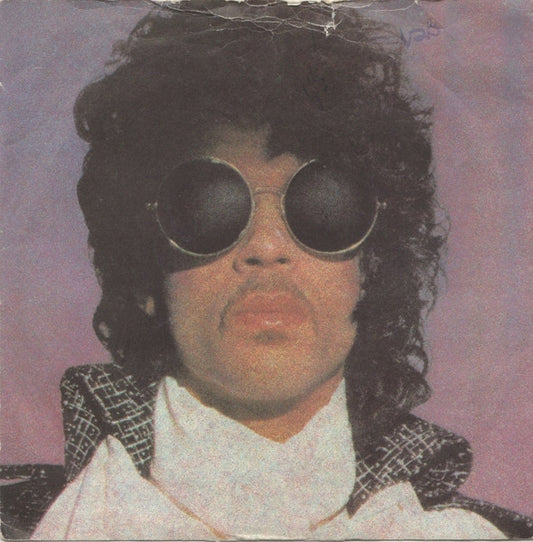 Image of Front Cover of 1524212E: 7" - PRINCE, When Doves Cry/ 17 Days (Warner Bros. Records; W9286, UK 1984, Picture sleeve) Light wear on edge of sleeve.  VG/VG+