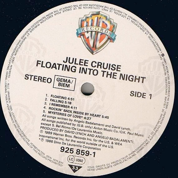Image of Label Cover of LP - VG/G+ - JULEE CRUISE, Floating Into The Night (Warner Bros. Records; 925 859-1, Europe 1989, Inner), , The haunting debut album by Julee Cruise, who played the nightclub singer in Twin Peaks, is made up of her songs on David Lynch soundtracks and original songs.Mysteries of Love is on Blue Velvet (Original Motion Picture Soundtrack).Falling, Into The Night and The Nightingale are on Soundtrack From Twin Peaks (which came out a year after this release). - 3026190E