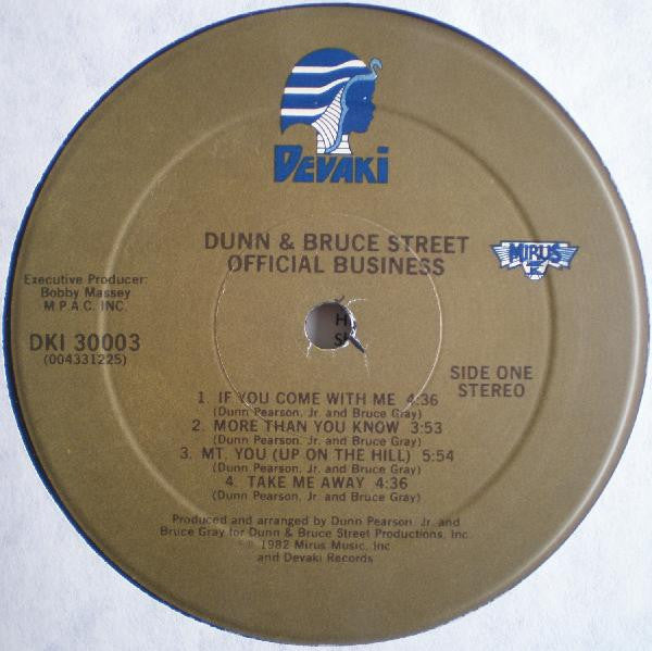 Image of Label Cover of 2124113E: LP - DUNN & BRUCE STREET, Official Business (Devaki Records; DKI 30003, US 1982, Picture Sleeve) Sleeve fully intact but first 3 inches from left back and front the art is completely ripped off. Light marks to record itself.  G/VG