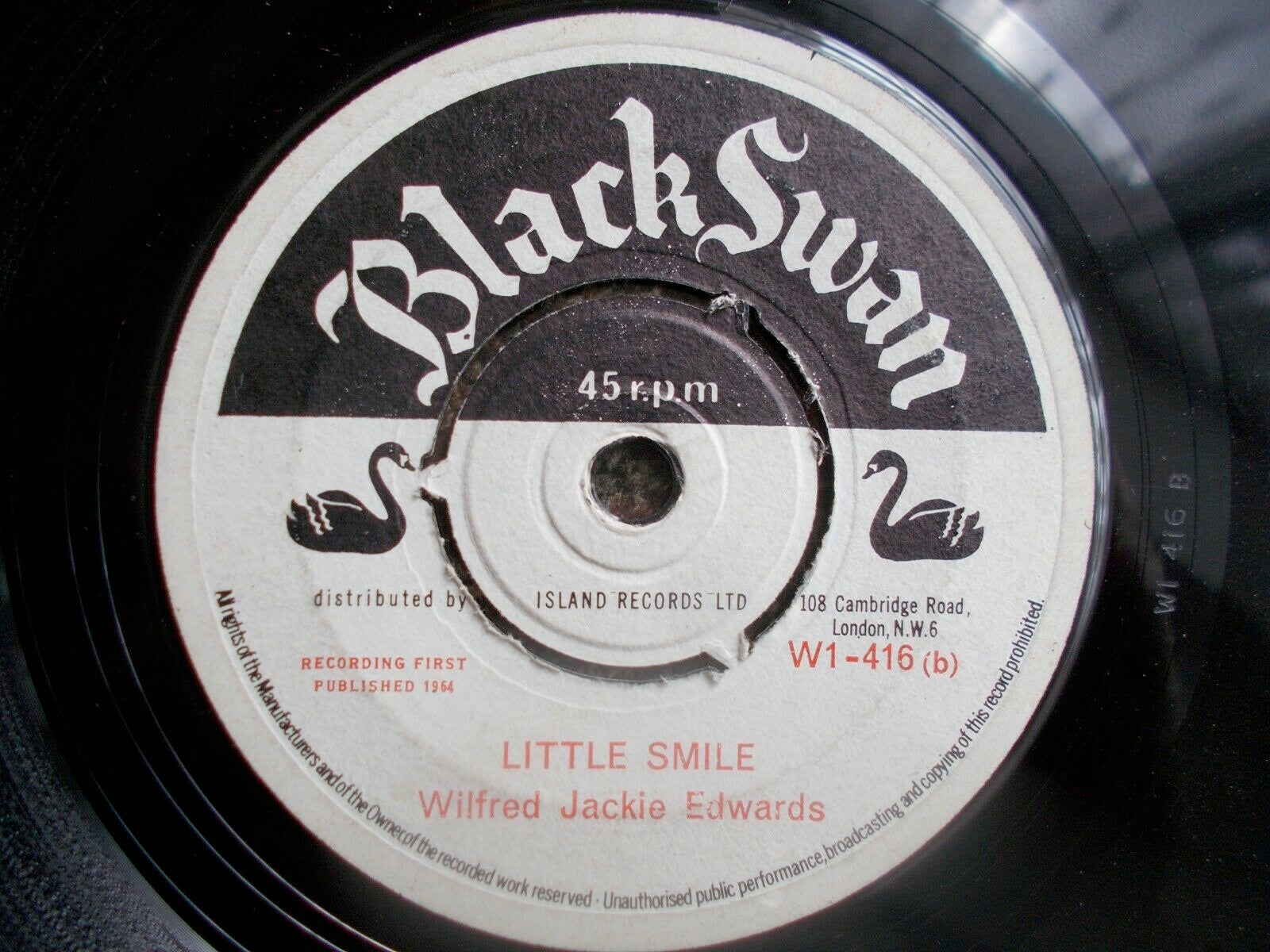 Image of Back Cover of 2114424C: 7" - WILFRED JACKIE EDWARDS, The Things You Do / Little Smile (Black Swan; W1-416, UK 1964) Record has very small chip at edge that doesn't affect play. Centre intact and clean labels  /VG+