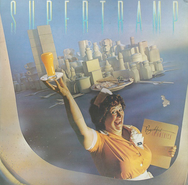 Image of Front Cover of LP - VG/VG - SUPERTRAMP, Breakfast In America (A&M Records; SP-3708, US 1979, Thick Card Sleeve With Orange Inside, Inner, Trumpet Stamp in Run out), Hairlines. Writing on sleeve, ring and edge wear, creasing. Seam split to inner.,  - 3846353S