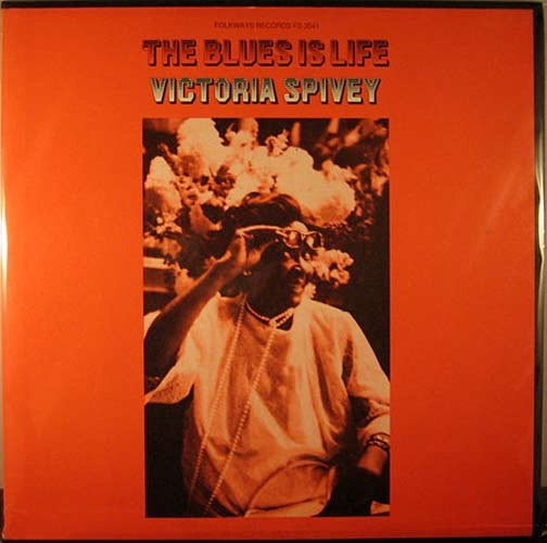 Image of Front Cover of 2214463C: LP - VICTORIA SPIVEY, The Blues Is Life (Folkways Records; FS 3541, US 1976, Folkways style sleeve) Mainly just storage marks on record. Spine discoloured and worn / damaged in a few places  VG/VG