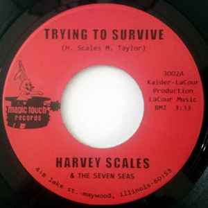 Image of Front Cover of 2324218E: 7" - HARVEY SCALES & THE SEVEN SEAS, Trying To Survive / Trackdown (Magic Touch Records; 3002, US Reissue, Plain sleeve) Light marks.  /VG+