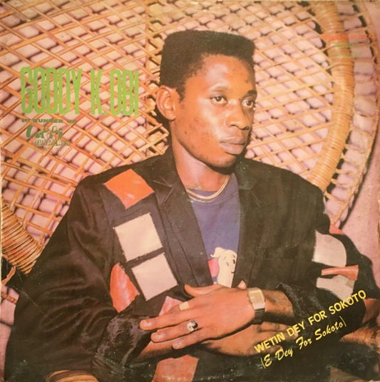 Image of Front Cover of 2314438C: LP - GODDY K. OBI, Wetin Dey For Sokoto (E Dey For Sokoto) (Polydor; POLP 212, Nigeria 1989) Spine and ring wear to sleeve. Lots of grubby marks throughout. Disc has quite a few light marks.  G+/G+