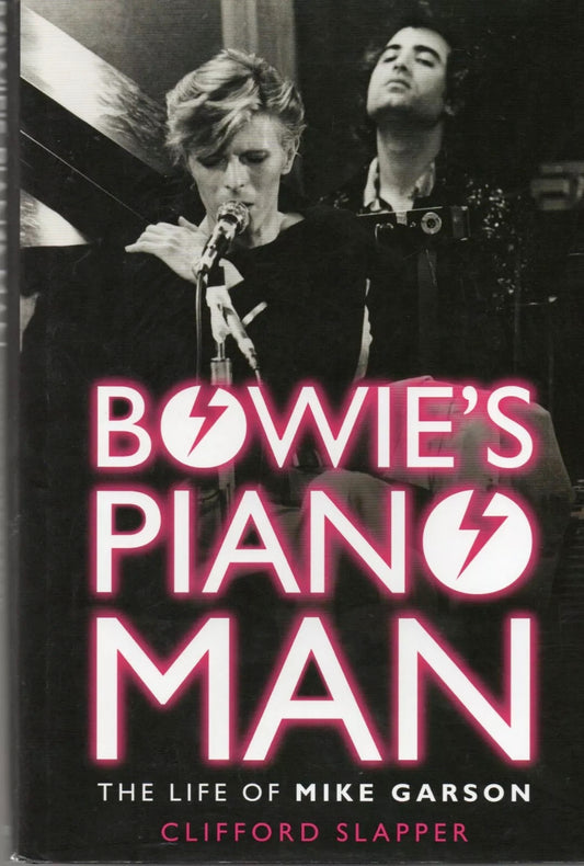 Image of Front Cover of 2334059E: Book - CLIFFORD SLAPPER, Bowie's Piano Man The Life of Mike Garson Ziggy Stardust (Fantom; , UK 2014, Hardback With Dust Jacket, Signed (with provenance) by Mike Garson. ) Dust jacket has mild wear but overall the book is a very nice copy  VG/EX