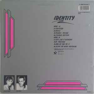 Image of Back Cover of 2544305S: LP - ZEE, Identity (Harvest ; SHSP 24 0101 1, UK 1984, Picture Sleeve) faint hairlines - minor. one mark - side b - doesnt affect play. some edge/shelf wear to sleeve  G+/VG