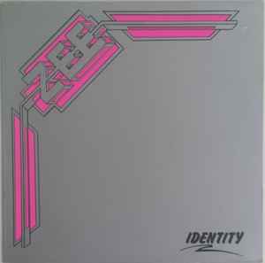 Image of Front Cover of 2544305S: LP - ZEE, Identity (Harvest ; SHSP 24 0101 1, UK 1984, Picture Sleeve) faint hairlines - minor. one mark - side b - doesnt affect play. some edge/shelf wear to sleeve  G+/VG